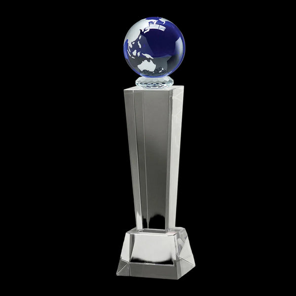 Crystal award with a blue glass sphere on a dark background