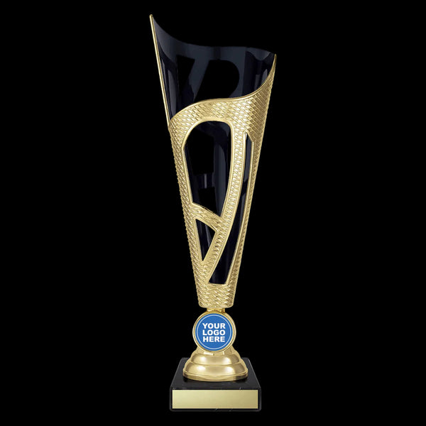 A modern trophy with a tall, flared gold and black design, featuring a textured gold body, a black circular inner section, a gold circular base, and a black rectangular pedestal with a gold plaque. A blue circular sticker on the base reads 'YOUR LOGO HERE'.